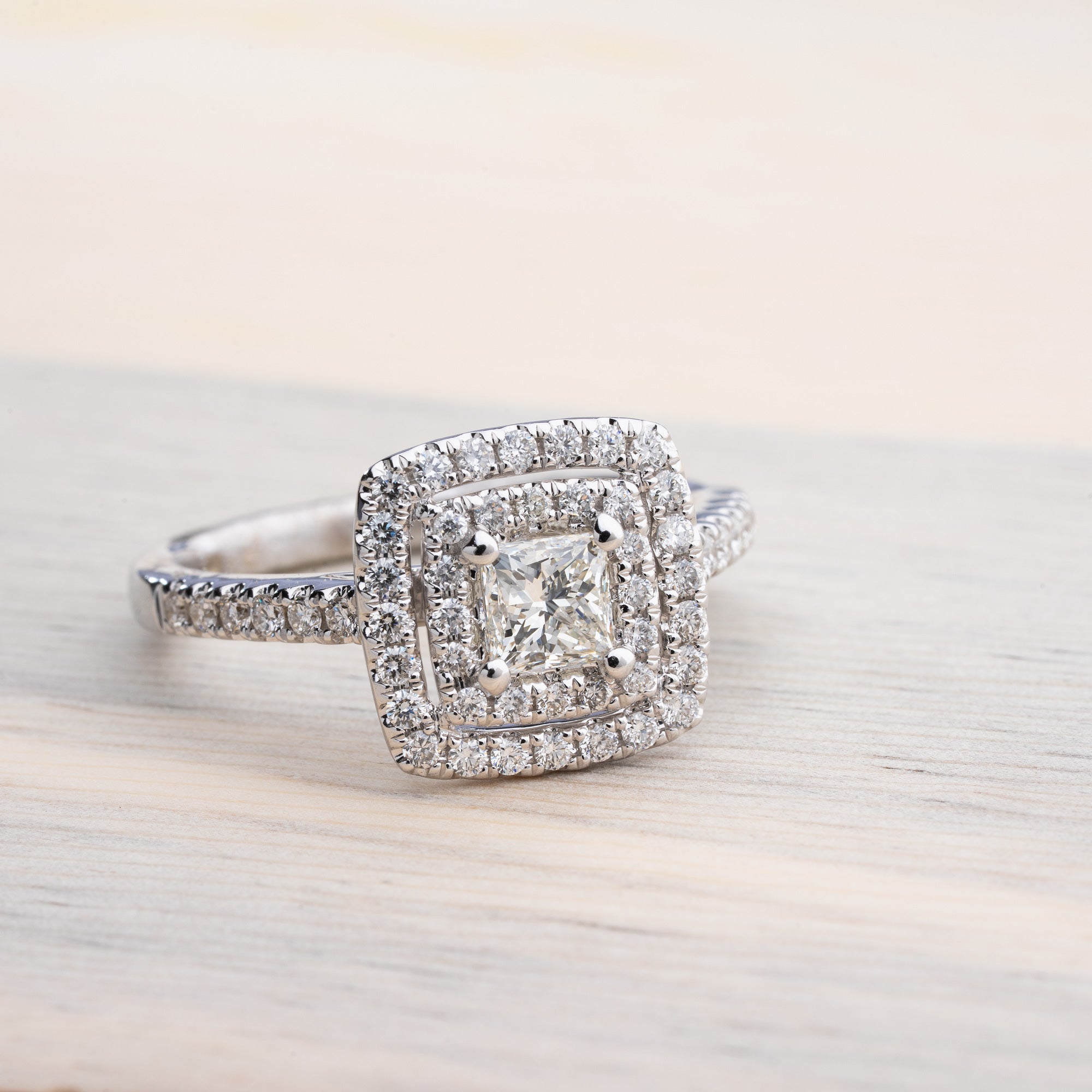 Various small diamond settings including round, princess, and heart shapes