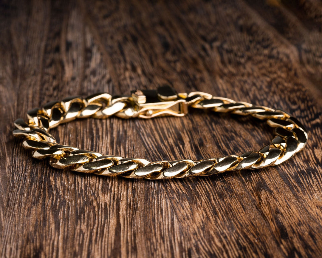 Sleek 14Kt Yellow Gold Cuban Link Bracelet - Elite Fine Jewelers