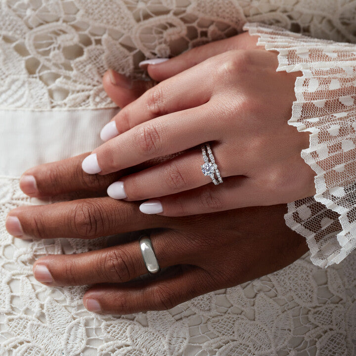 Engagement Ring Shopping As A Couple Man and woman both wearing rings