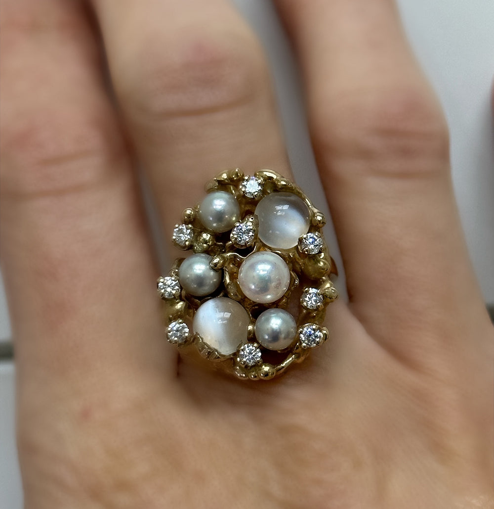 Mid-century cultured pearl and cat's eye moonstone cocktail ring on hand