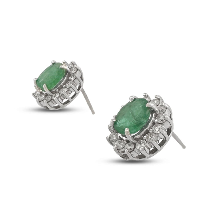 Oval Emerald and Natural Diamond Earrings in 14k White Gold