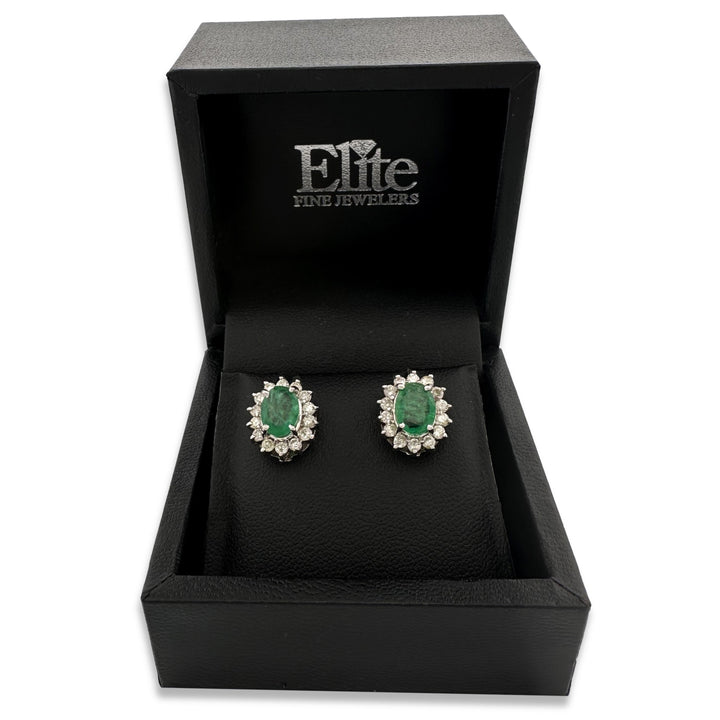 Oval Emerald and Natural Diamond Earrings in 14k White Gold