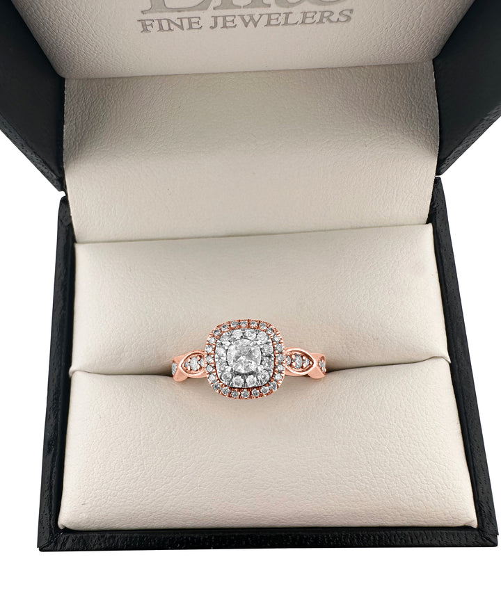 Diamond double halo with scalloped sides, set in 14k rose gold ring, in a ring box