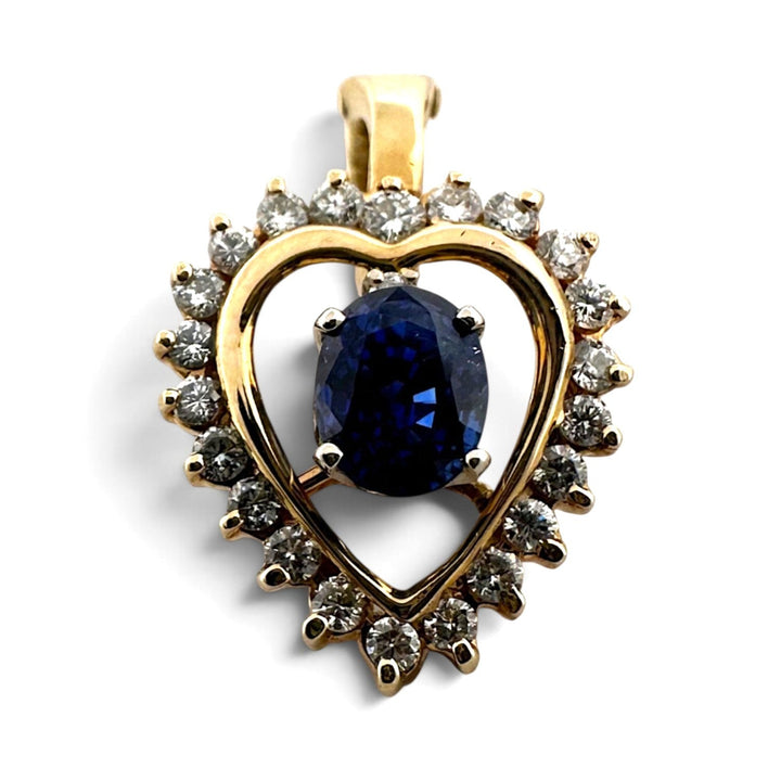Oval Sapphire And Natural Round Brilliant Diamond Heart Pendant Necklace in 14k Yellow Gold