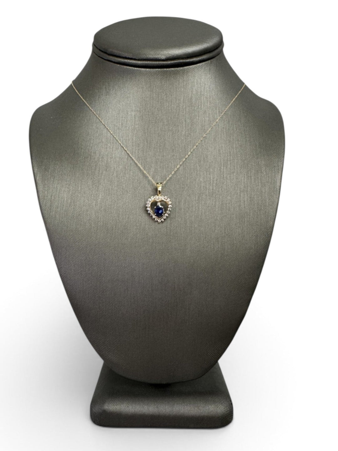 Oval Sapphire And Natural Round Brilliant Diamond Heart Pendant Necklace in 14k Yellow Gold