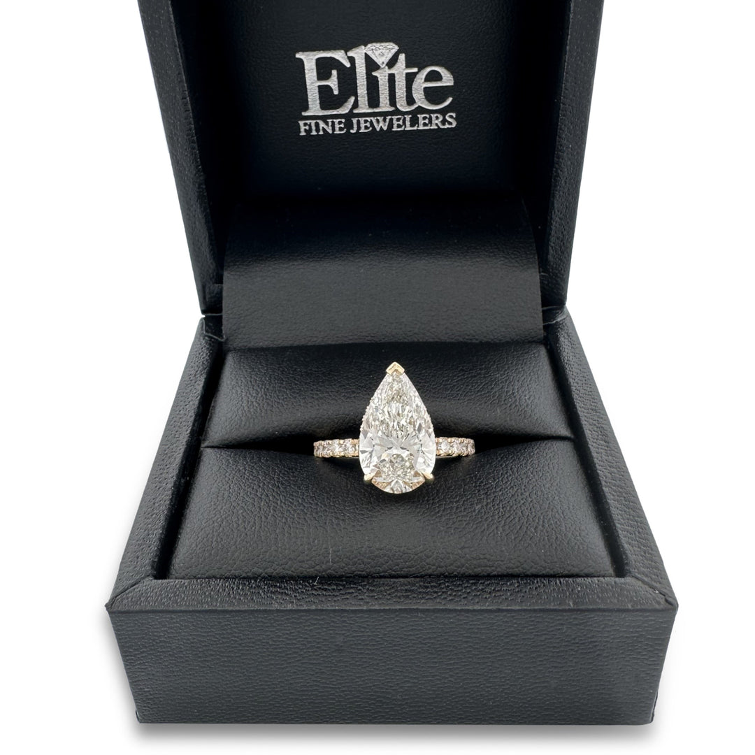 IGI Graded 4.01ct Pear with Round Brilliants Lab-Grown Diamond Hidden Halo Engagement Ring in 14k Yellow Gold