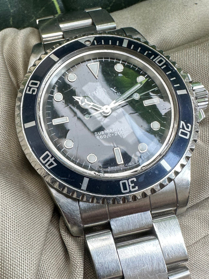 1989 Rolex Submariner 40mm 'Ghost Bezel' Stainless Steel Oyster Bracelet Watch