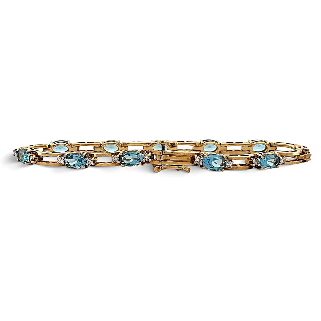 Oval Blue Topaz and Round Brilliant Natural Diamond Link Tennis Bracelet in 18k Yellow Gold