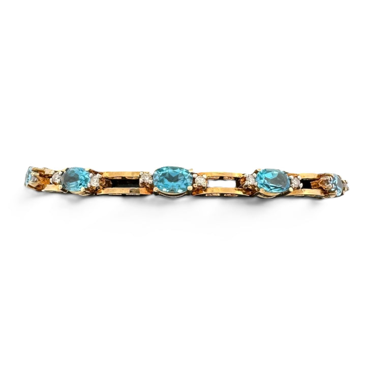 Oval Blue Topaz and Round Brilliant Natural Diamond Link Tennis Bracelet in 18k Yellow Gold