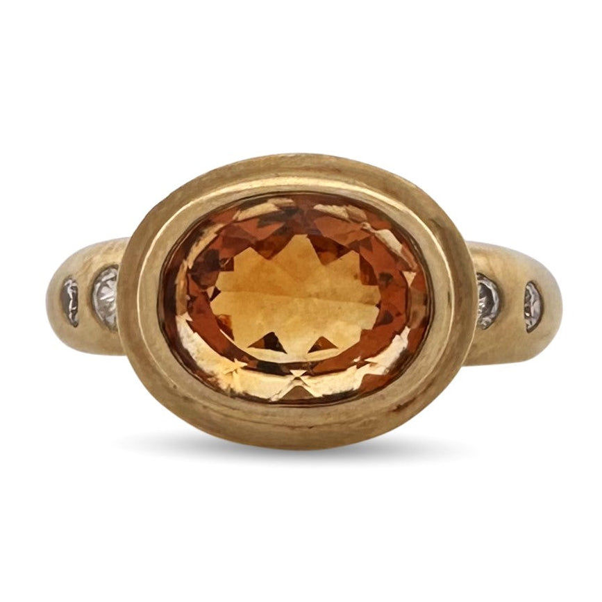 Oval Citrine and Natural Round Brilliant Diamond Bezel-Set East-West Cocktail Ring in 18k Yellow Gold