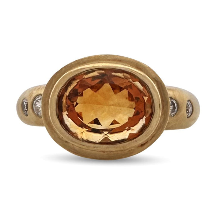 Oval Citrine and Natural Round Brilliant Diamond Bezel-Set East-West Cocktail Ring in 18k Yellow Gold