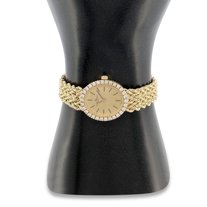 Vintage 1990's Lady's Baume & Mercier Diamond Quartz Watch in 14k Yellow Gold
