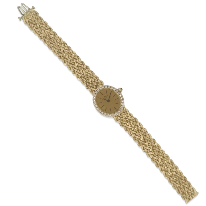 Vintage 1990's Lady's Baume & Mercier Diamond Quartz Watch in 14k Yellow Gold