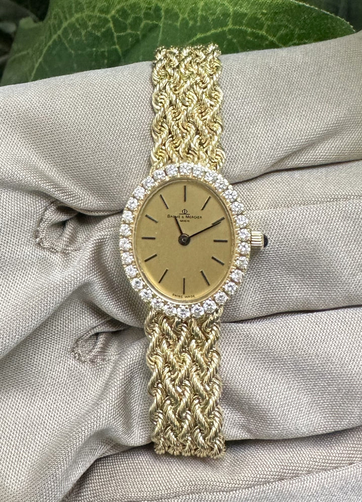 Vintage 1990's Lady's Baume & Mercier Diamond Quartz Watch in 14k Yellow Gold