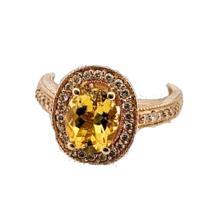 14k yellow gold Heliodor ring with diamond halo.