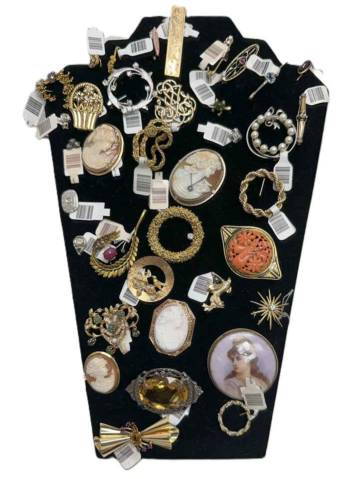 We have a large selection of estate and vintage brooches.