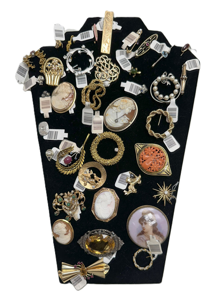 We have many vintage brooches