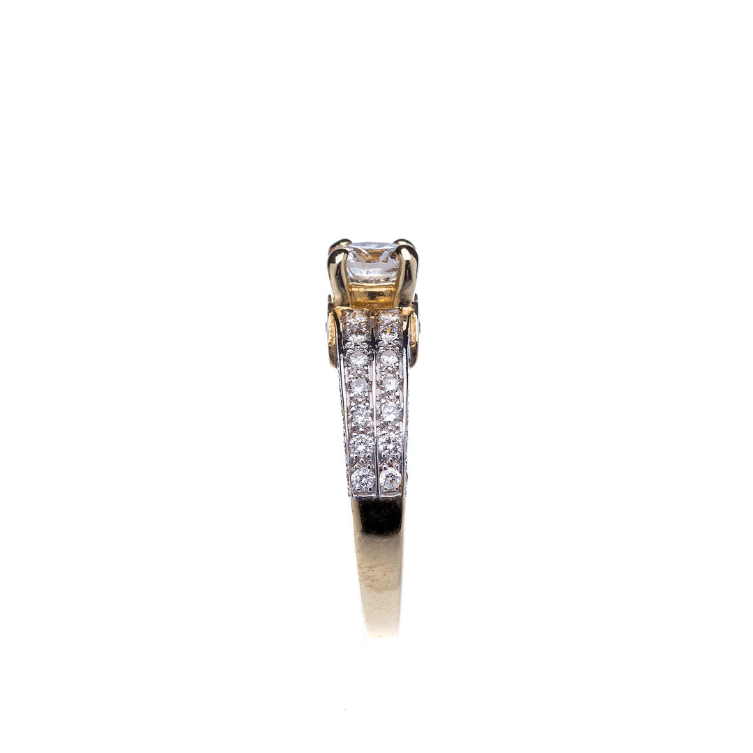 0.69ct Diamond set in Yellow Gold and Diamond Engagement Ring - Elite Fine Jewelers