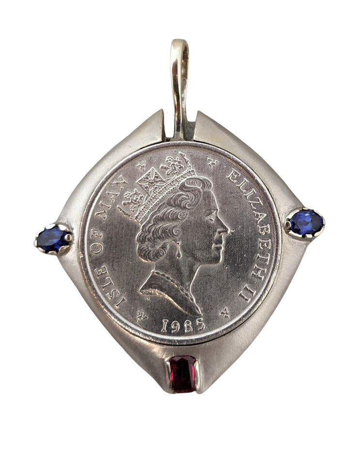1 ozt platinum coin in 14k white gold bezel - Elite Fine Jewelers