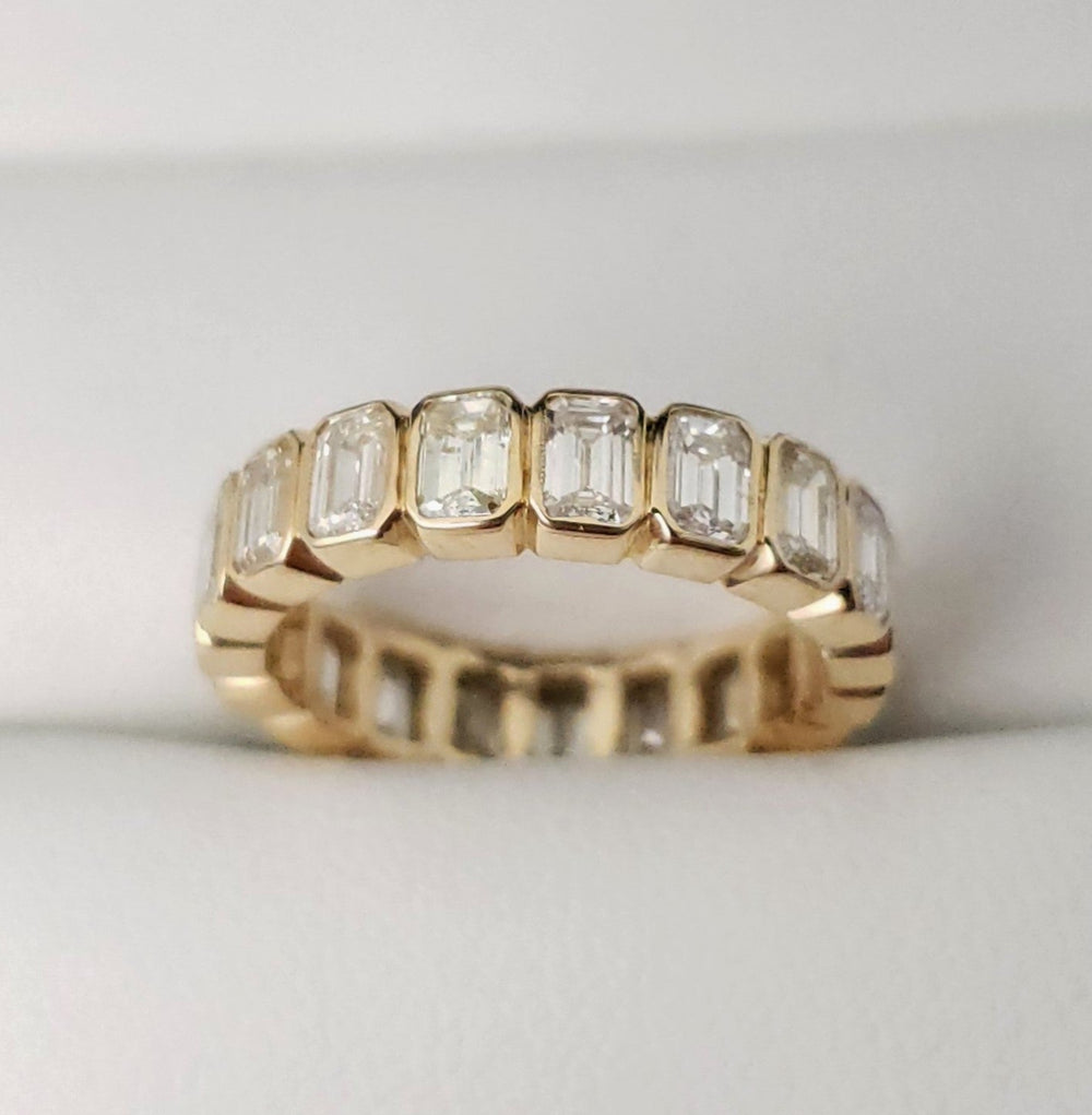 14K Bezel Set Emerald Cut Diamond Eternity Band - Elite Fine Jewelers