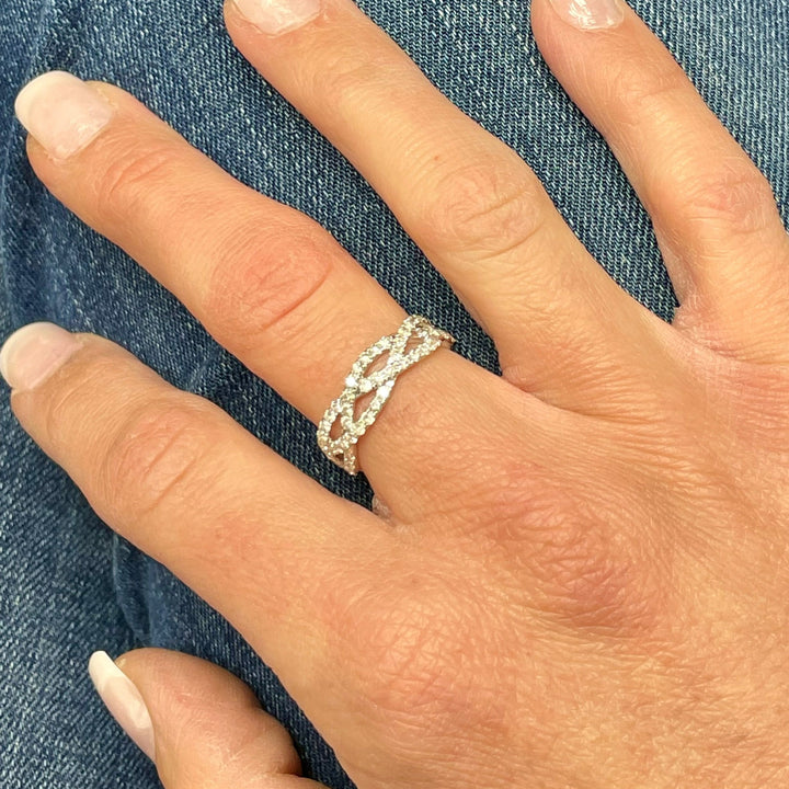 14K Gold Diamond Criss-Cross Ring, on finger - Elite Fine Jewelers