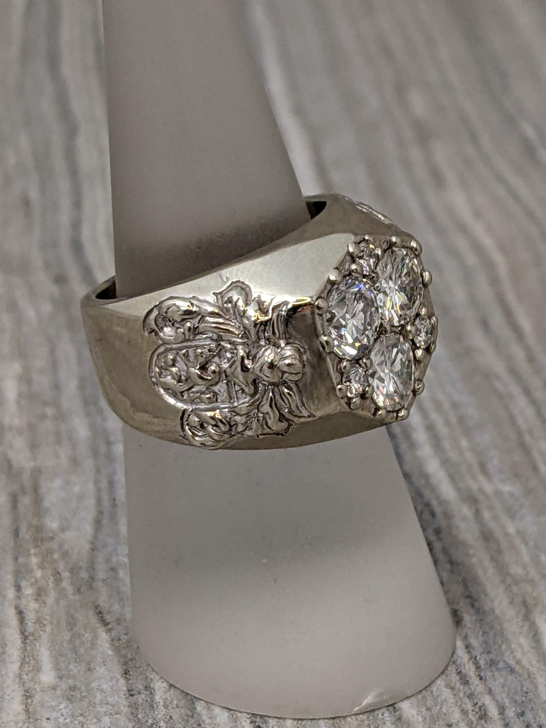 14k white gold and diamond pinky ring with coat of arms design - Elite Fine Jewelers