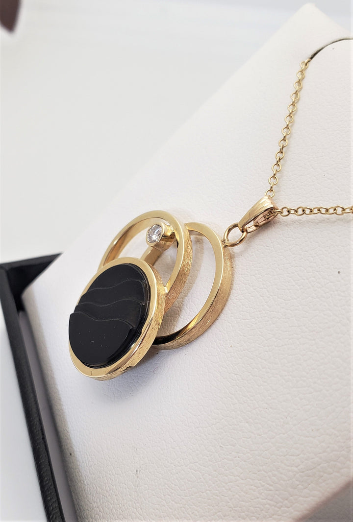 14k Yellow Gold Diamond and Black Onyx Pendant ( chain not included ) - Elite Fine Jewelers