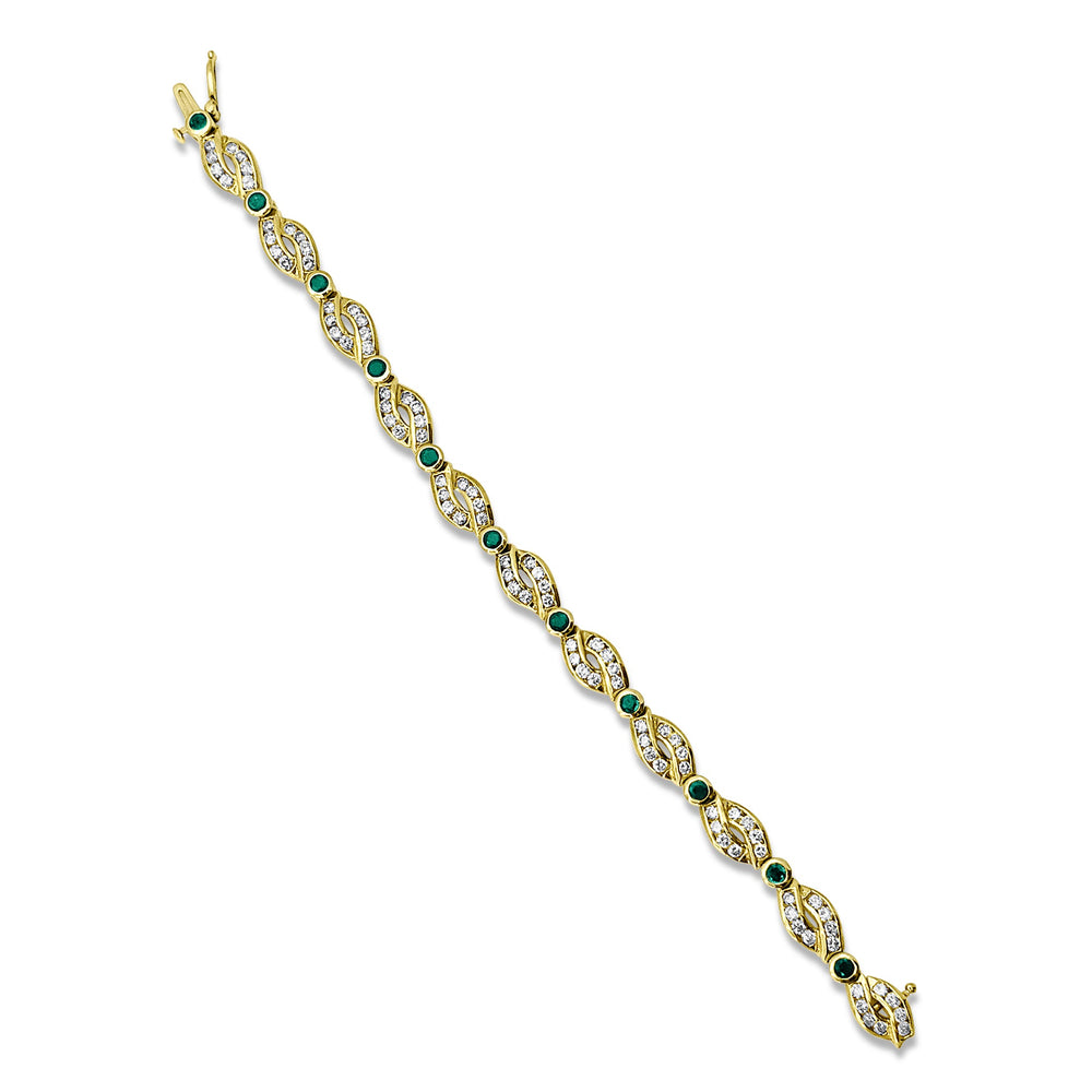 14k Yellow Gold Diamond and Emerald Tennis Bracelet. - Elite Fine Jewelers