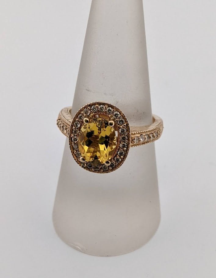 14k yellow gold Heliodor ring with diamond halo. - Elite Fine Jewelers