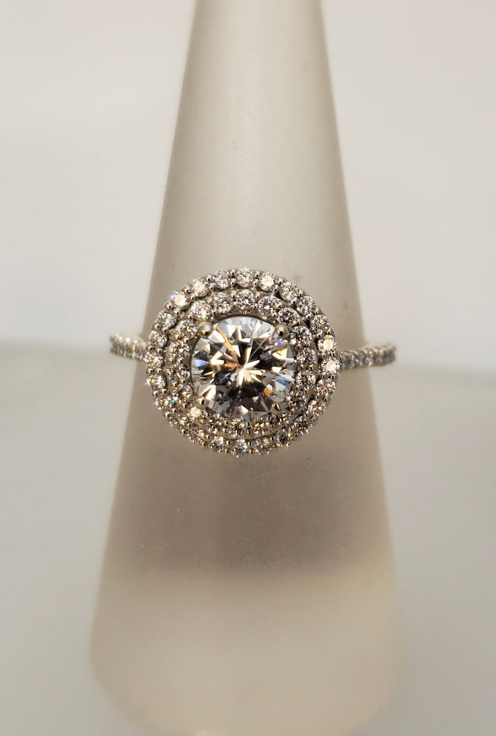 Double halo round brilliant diamond engagement ring
