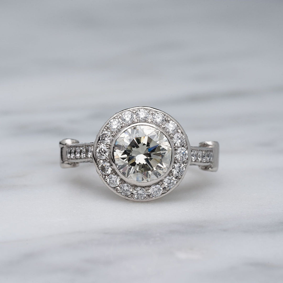 4 carat bezel set round brilliant diamond engagement ring