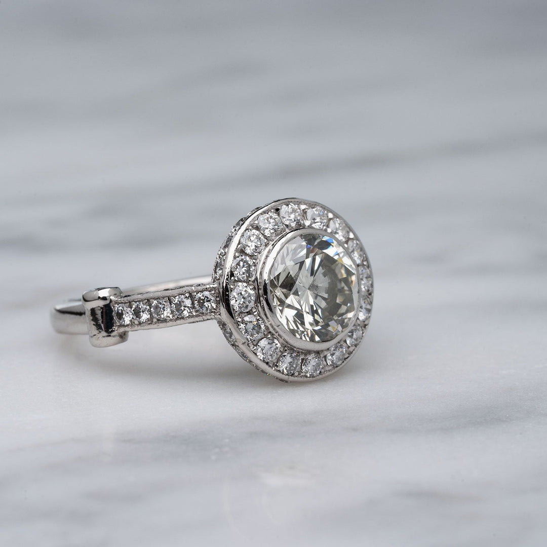 4 carat bezel set round brilliant diamond engagement ring Side view