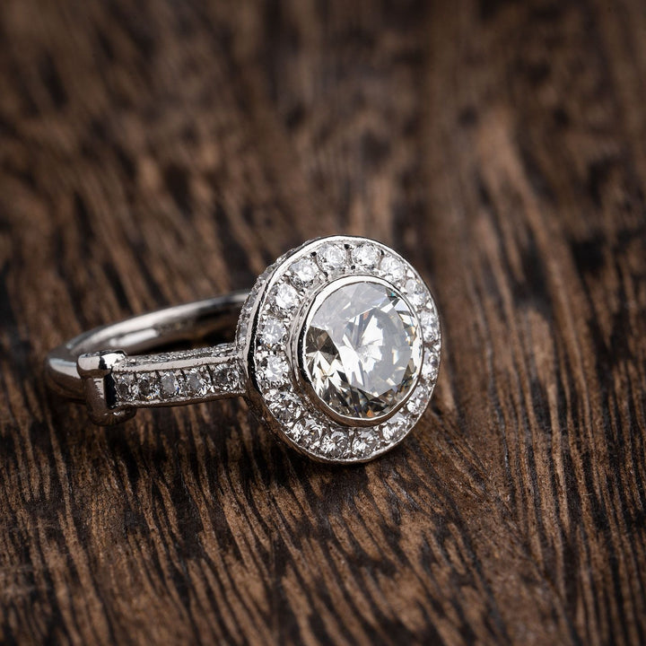 4 carat bezel set round brilliant diamond ring