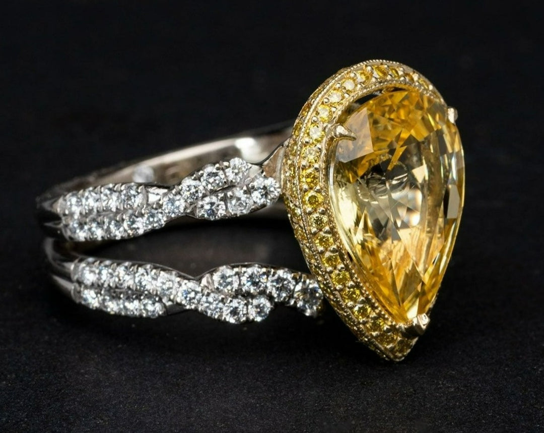 Yellow sapphire ring with a yellow diamond halo 