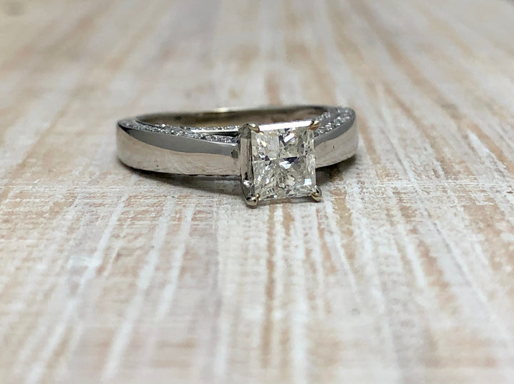 Princess Cut Engagement Ring With Diamonds Embedded In The Cathedral Setting - Elite Fine Jewelers