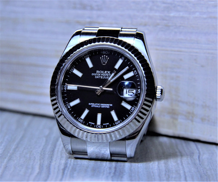 Sold Rolex Datejust II with a black dial and fluted bezel. - Elite Fine Jewelers