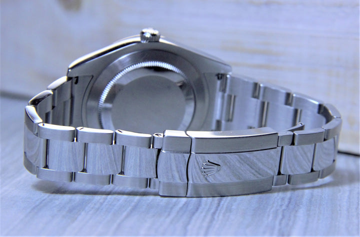 Sold Rolex Datejust II with a black dial and fluted bezel. - Elite Fine Jewelers