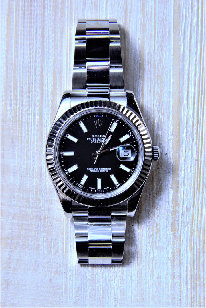 Sold Rolex Datejust II with a black dial and fluted bezel. - Elite Fine Jewelers